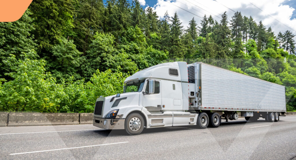 A truck being loaded or unloaded at a dock, illustrating the truck shipping process